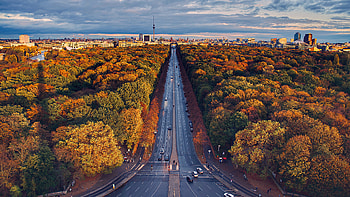 Vehicles On Road Between Colorful Autumn Trees Under Blue Sky graphy graphy HD wallpaper