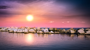 Sea, shore, rocks, sunset HD wallpaper