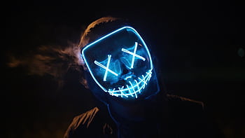 Spooky glowing LED mask in the dark, perfect for Halloween or horror themes. HD wallpaper