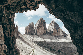 Mountain Range Through Cave, mountains, cave, nature HD wallpaper