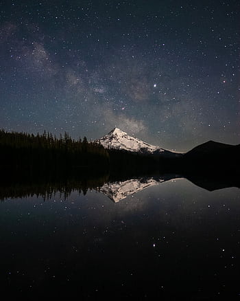 Snow-capped Mount Hood reflected in a serene lake under a starry sky, Oregon. HD phone wallpaper