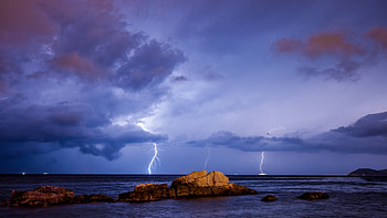 spectacular lightning off shore, sea, lightning, shore, clouds, rocks HD wallpaper