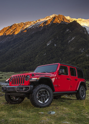 Red 4x4 SUV Jeep Wrangler , Eye-catching beauty, Off-road beast, Commanding presence HD phone wallpaper