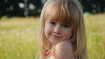 Cute Little Girl Is Standing In Blur Bokeh Background Wearing Colorful Dress Cute HD wallpaper