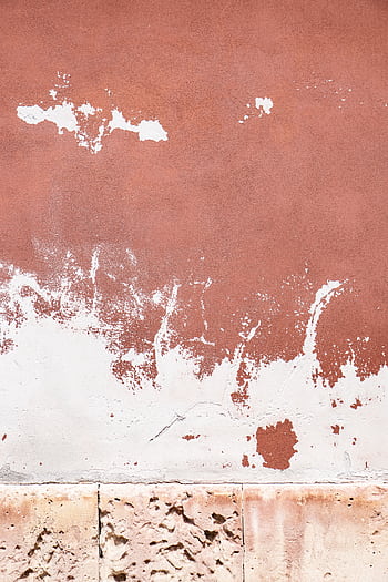 Close-up view of a weathered wall with peeling paint, showcasing a rustic and textured aesthetic. HD phone wallpaper