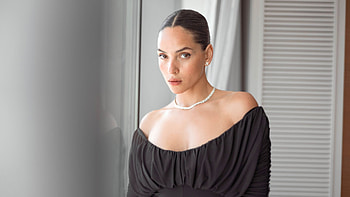 Girl Model Adria Arjona Is Standing In White Wall Background Wearing Black Dress Girls HD wallpaper