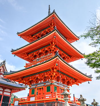 Vibrant pagoda at Kiyomizu-dera temple, a prominent landmark in Kyoto, Japan. HD phone wallpaper