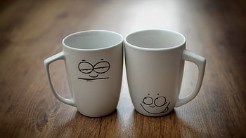 Two cups of coffee, Saucers, Wooden tabletop HD wallpaper
