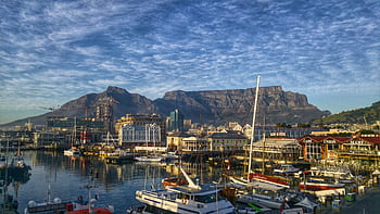 Stunning view of Cape Town harbor with boats and iconic Table Mountain backdrop. HD wallpaper
