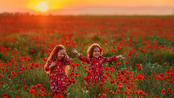 Smiling Two Cute Little Girls Are Standing In Red Common Poppy Flowers Field During Sunset Cute HD wallpaper