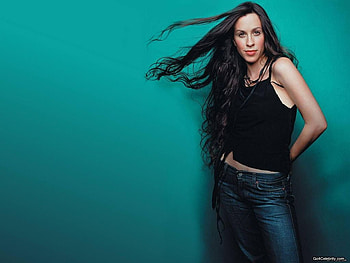 Alanis Morrissete, green wall, cute, singer, long hair, female HD wallpaper