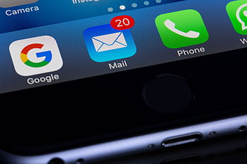 A close-up of a smart displaying popular apps like Google and Mail. HD wallpaper