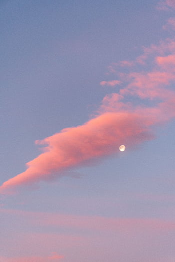 A tranquil sky with pastel pink clouds and a visible moon at twilight, perfect for calming backgrounds. HD phone wallpaper
