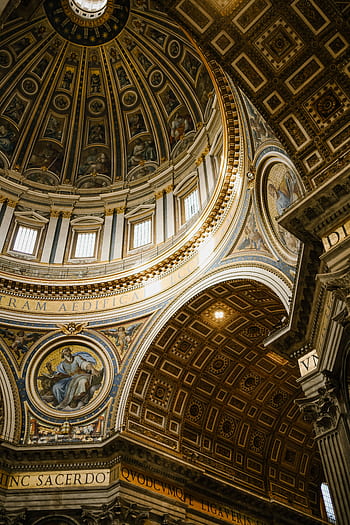 Intricate and majestic view of St. Peter's Basilica dome showcasing baroque architecture in Rome. HD phone wallpaper