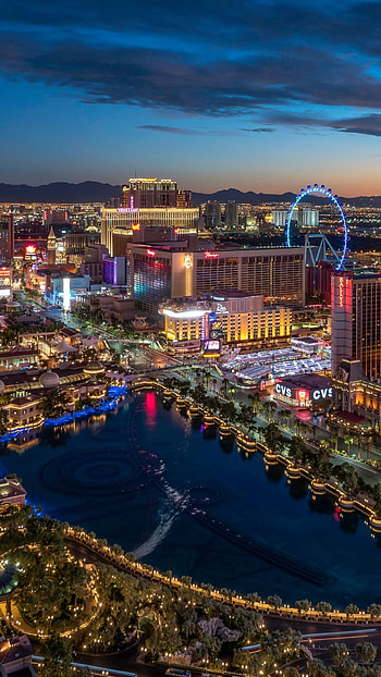 Las Vegas Skyline, Nighttime allure, Glittering lights, Iconic architecture HD phone wallpaper