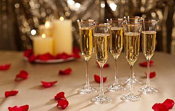 Bubbles, candles & rose petals, white candles, champagne, New Years Eve, sparkle, flute glasses, Celebration, red rose petals HD wallpaper