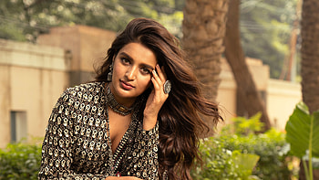 Black Hair Nidhhi Agerwal Actress Is Wearing Black White Dress Sitting In Blur Nature Background Girls HD wallpaper
