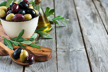 Olives, wooden, leaves, olive oil, bowl, spoon HD wallpaper