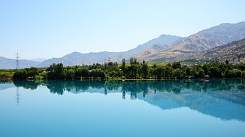 Beautiful Scenery Trees Bushes Grass Houses Village Mountains Slope Under Blue Sky Reflection On Lake Nature HD wallpaper