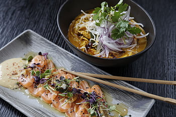 Delicious Japanese sashimi and ramen beautifully presented, showcasing authentic Asian flavors. HD wallpaper
