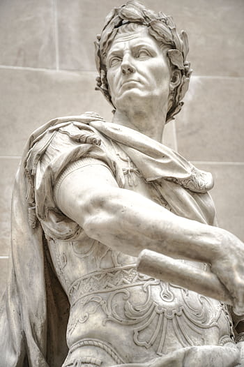 Close-up of an ancient Roman marble statue capturing a historical leader's presence. HD phone wallpaper