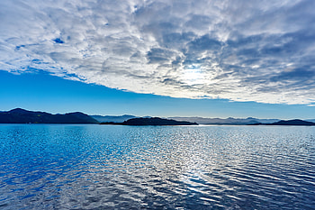 Vibrant Clouds Over Lake Seascape, clouds, seascape, lake, nature HD wallpaper