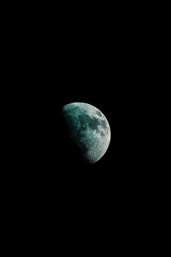 A captivating crescent moon illuminating the dark night sky, showcasing lunar details. HD phone wallpaper