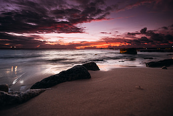 Lone beach, evening, rocks, clouds, nature HD wallpaper