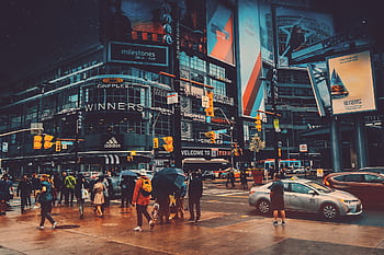 Explore the bustling nightlife and urban energy at Yonge-Dundas Square in Toronto, Canada. HD wallpaper