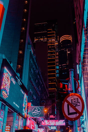 Explore the vibrant neon-lit streets of Kowloon, Hong Kong, capturing the bustling nightlife and urban allure. HD phone wallpaper