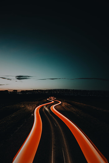 Road in night, red light trail, curves HD phone wallpaper