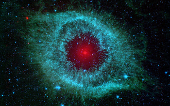 This infrared from NASA's Spitzer Space Telescope shows the Helix nebula, a cosmic starlet HD wallpaper
