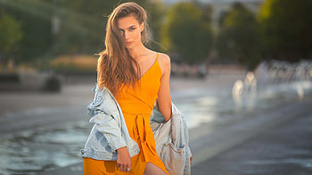 Stunning Beauty Girl Model Is Standing In Blur Water Background Wearing Yellow Dress Girls HD wallpaper