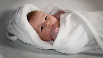 Cute Boy Baby Is Covering With White Baby Towel Lying Down On Bed Cute HD wallpaper