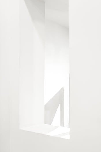 A minimalist abstract white interior space showcasing clean lines and modern architecture. HD phone wallpaper