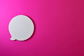Minimalist pink background with a white speech bubble for creative design projects. HD wallpaper