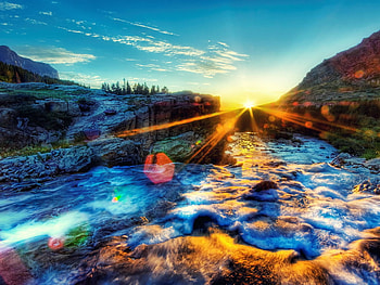 Stunning Sunset, blue, sunshine, sunny, colorful, beautiful, green, yellow, cool, clouds, nature, sky, amazing, water, forest, sunset, stunning HD wallpaper