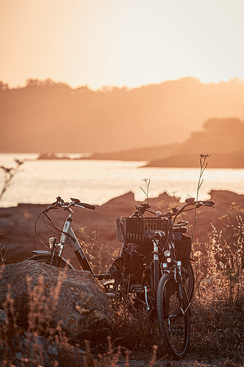 Sunset, Rock, Lake, Miscellanea, Miscellaneous, Stone, Stroll, Bicycle HD phone wallpaper