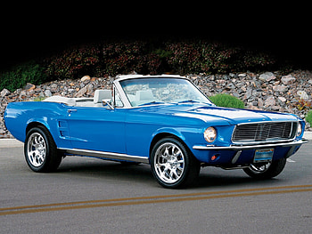 Blue Ford Mustang Cabrio, blue, ford, headlights, cars, grill, mustang, grass, rocks, wheels, daylight, day, windshield, cabrio, lights, trees, nature HD wallpaper