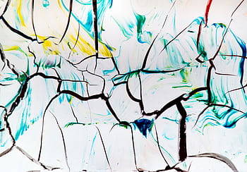 Vivid abstract artwork featuring cracked paint with colorful swirls and lines. HD wallpaper