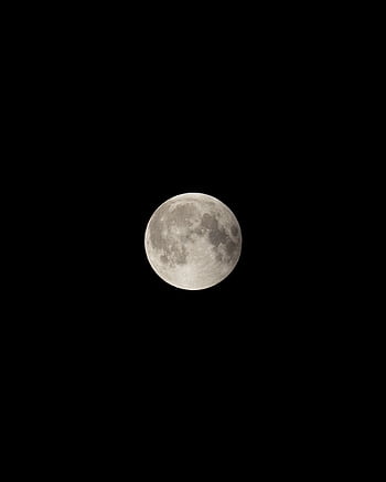 Stunning capture of a full moon illuminating the dark night sky with detailed lunar craters. HD phone wallpaper