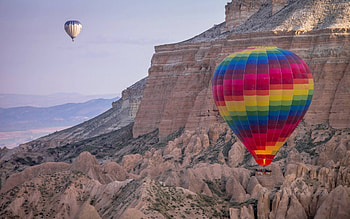 balloons by a mountain, balloons, fun, cool, nature, mountain HD wallpaper