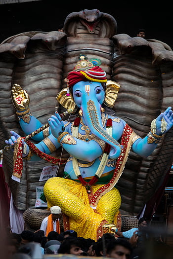 Colorful Ganesha statue during Ganesh Chaturthi celebration in Mumbai, India. HD phone wallpaper