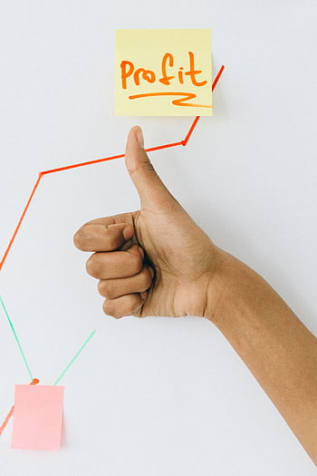 A hand giving a thumbs up in front of a profit growth chart, highlighting success. HD phone wallpaper