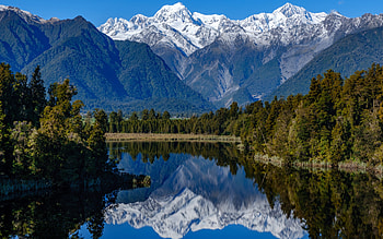 Lake Matheson, mountain lake, Southern Alps, mountain landscape, forest, mountains, New Zealand HD wallpaper