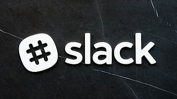 Close-up of Slack logo with hashtag symbol on a dark textured background, emphasizing digital communication. HD wallpaper