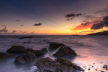 Sea, sunset, rocks, sky HD wallpaper