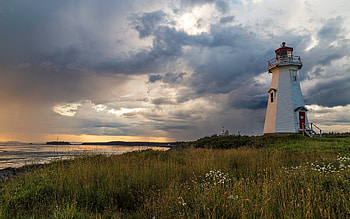 Lighthouse in Canada, lighthouse, Canada, sea, clouds, meadow, grass HD wallpaper