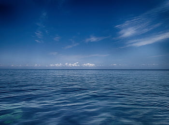 Breathtaking view of serene blue ocean and sky in Crveni Vrh, Croatia, evoking calm and relaxation. HD wallpaper