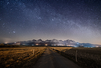 Landscape, mountains, road, starry night HD wallpaper